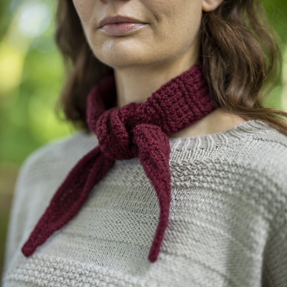 The Cassilis Scarf knitted in Orry Yarn Merino DK, showing the angled shaping and ridged texture.
