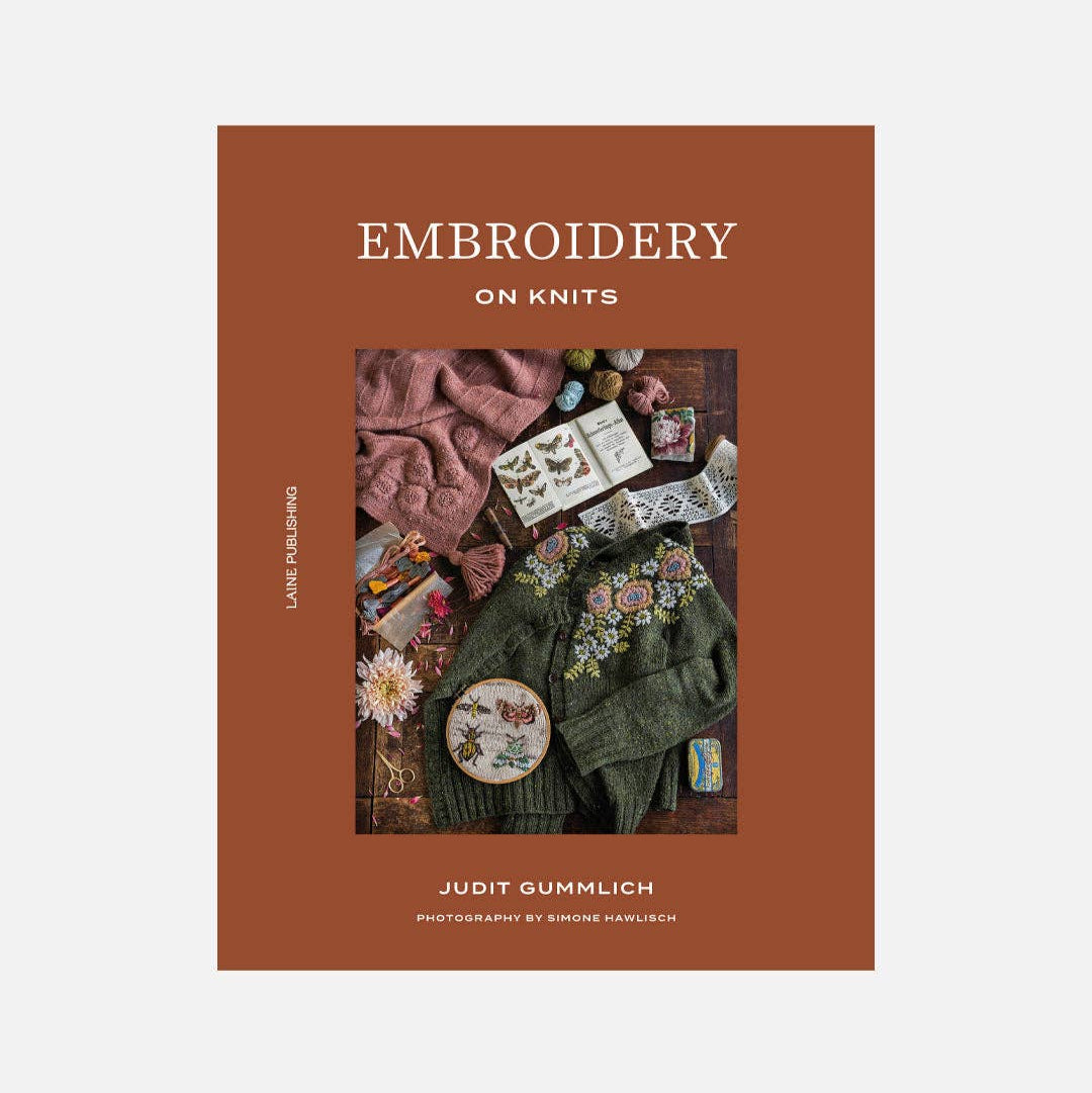 Book cover of 'Embroidery on Knits' with images of embroidered knits and text.