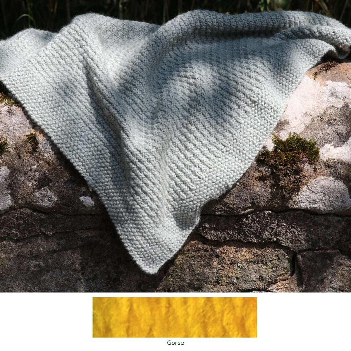 Alloway Raindrops Baby Blanket knitting kit in Gorse, with the yarn shade shown