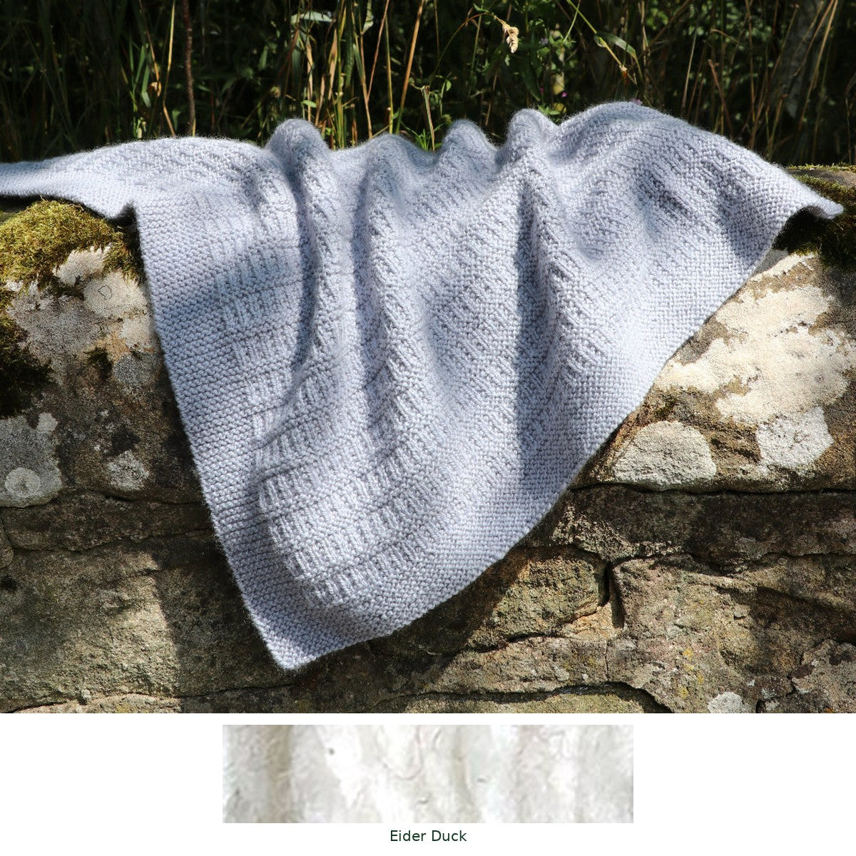 Cassillis Baby Blanket knitting kit in Eider Duck, with the yarn shade shown