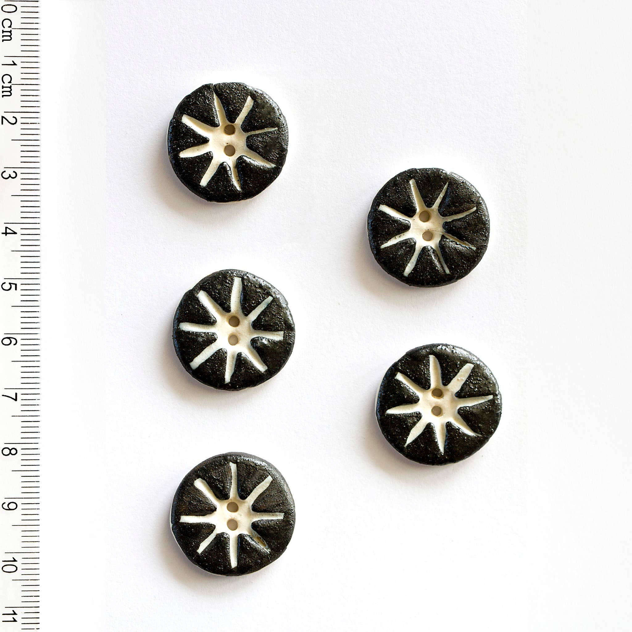 Incomparable Buttons - 5 Black Star Patterned Buttons
